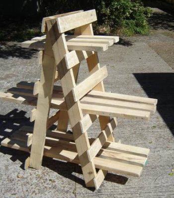 handmade wooden pallet ladder style display unit