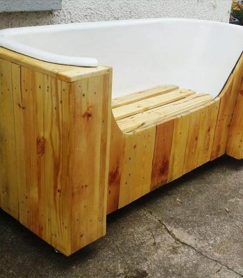 self-made pallet and old bathtub bench